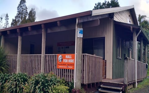 Small timber hall with covered veranda and Hall for Hire sign