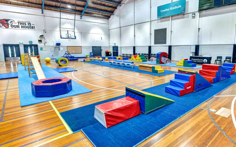 Sports hall with gymnastics equipment on a timber floor