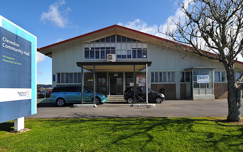 Clevedon Community Hall two-storey exterior with signage and parked cars