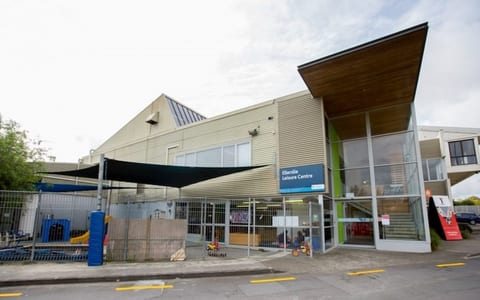 Ellerslie Leisure Centre building with corrugated cladding and glazed entrance