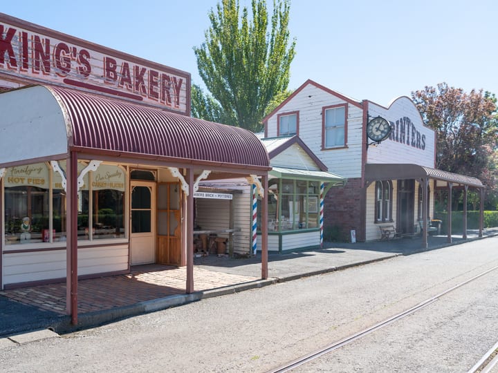 Heritage village streetscape with King's Bakery and Printers shopfronts