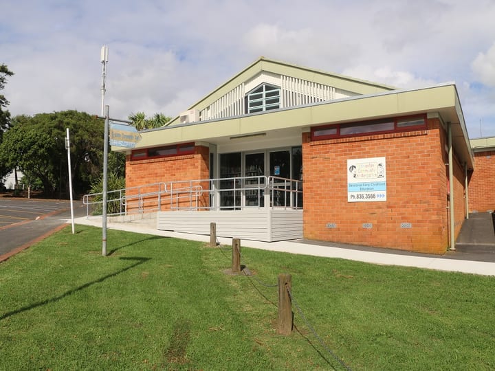 Single-storey brick and cladding building with ramp and early childhood centre signage