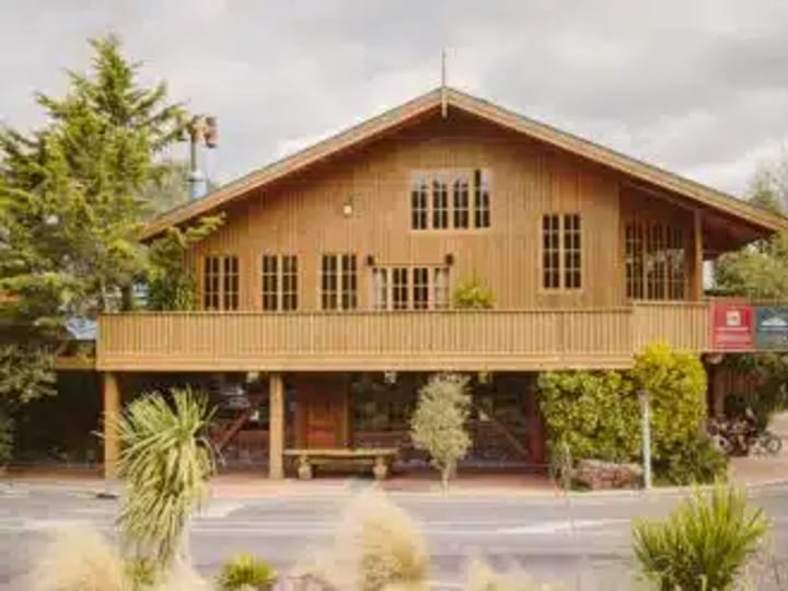 Exterior of Powderhorn Chateau, a two-storey timber alpine chalet