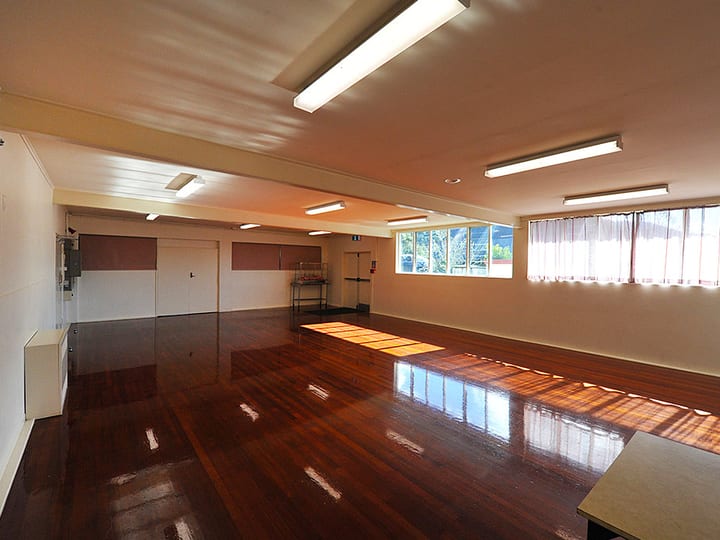 Supper room with polished timber floor and large windows