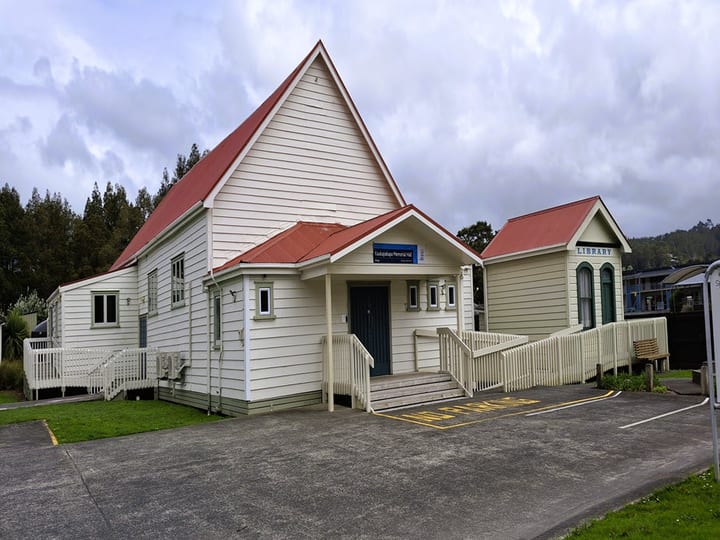 White timber memorial hall exterior from side angle