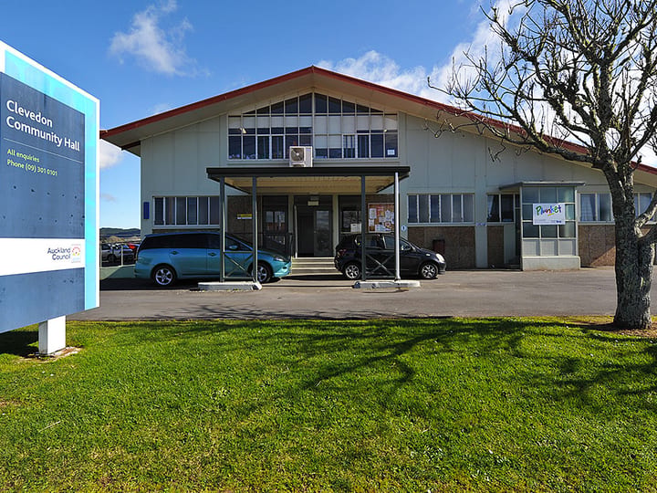 Clevedon Community Hall two-storey exterior with signage and parked cars