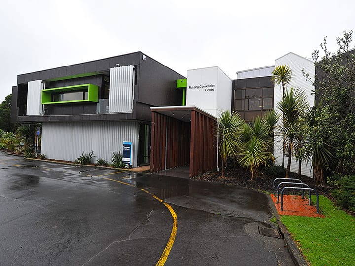 Fickling Convention Centre exterior with dark panels and green highlights